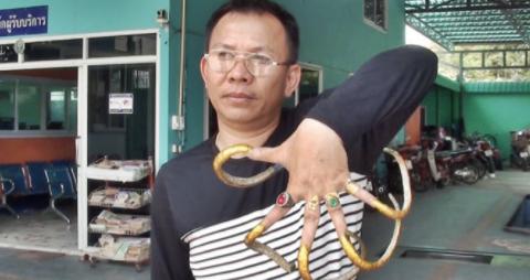 泰国男子留20厘米长（13万黄金指甲）-第2张